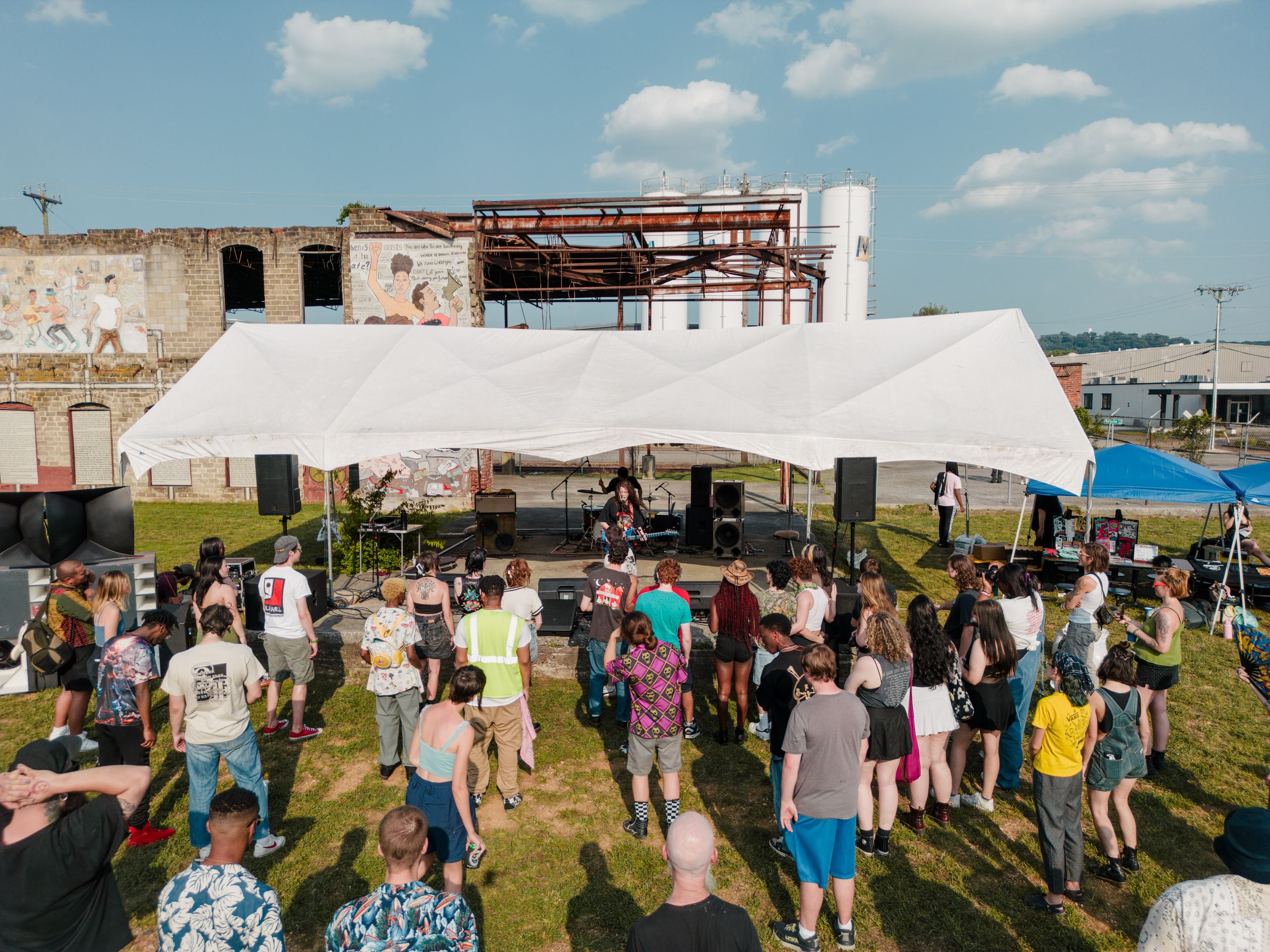 Outdoor concert with diverse crowd enjoying live music in Chattanooga, Tennessee.